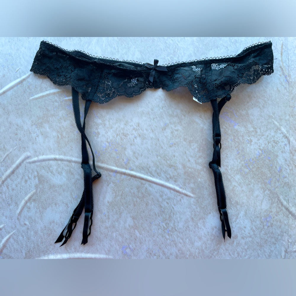 Victoria’s Secret black lace garter belt​​​​​​ s